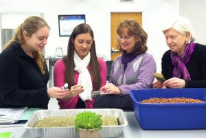 WJU students join faculty member Dr. Mary Railing and Dr. Laurie Ruberg, founder of the new Wheeling-based tech company, PLANTS, LLC in examining hydroponics systems.